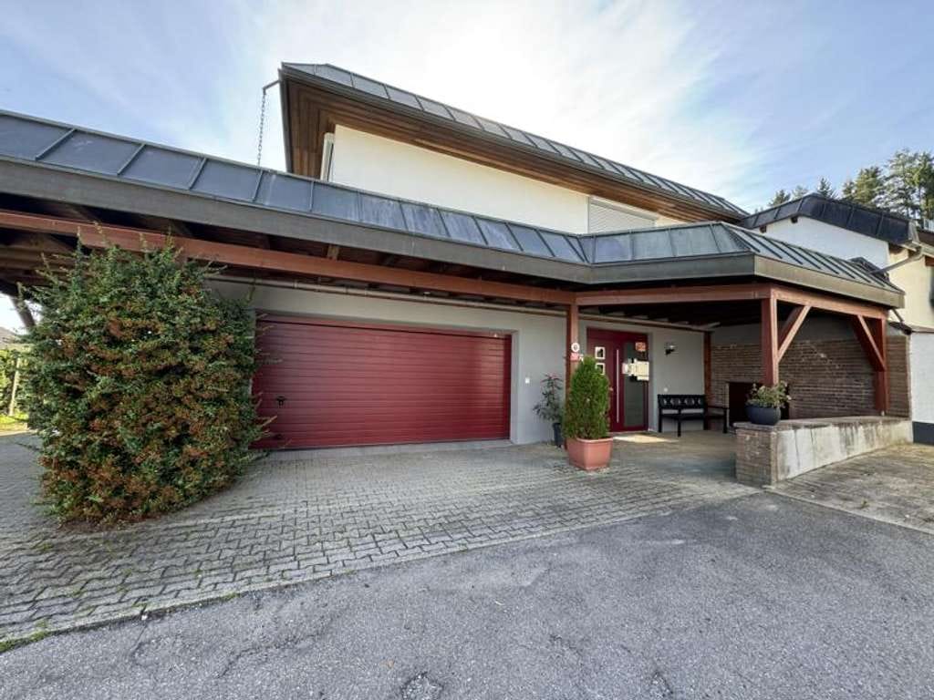 Immobilie in Waldachtal - Einfamilienhaus mit traumhaften Pool und Gartenparadies - Bild 2