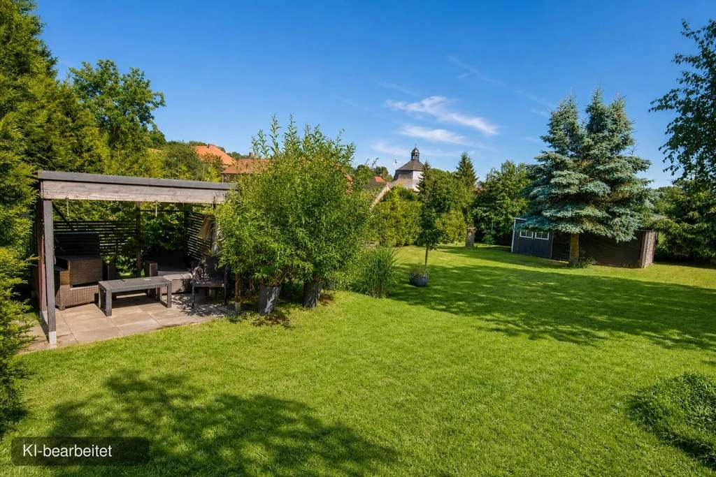 Immobilie in Ausleben - Modernisiertes Einfamilienhaus mit Wintergarten und Doppelgarage - Bild 2