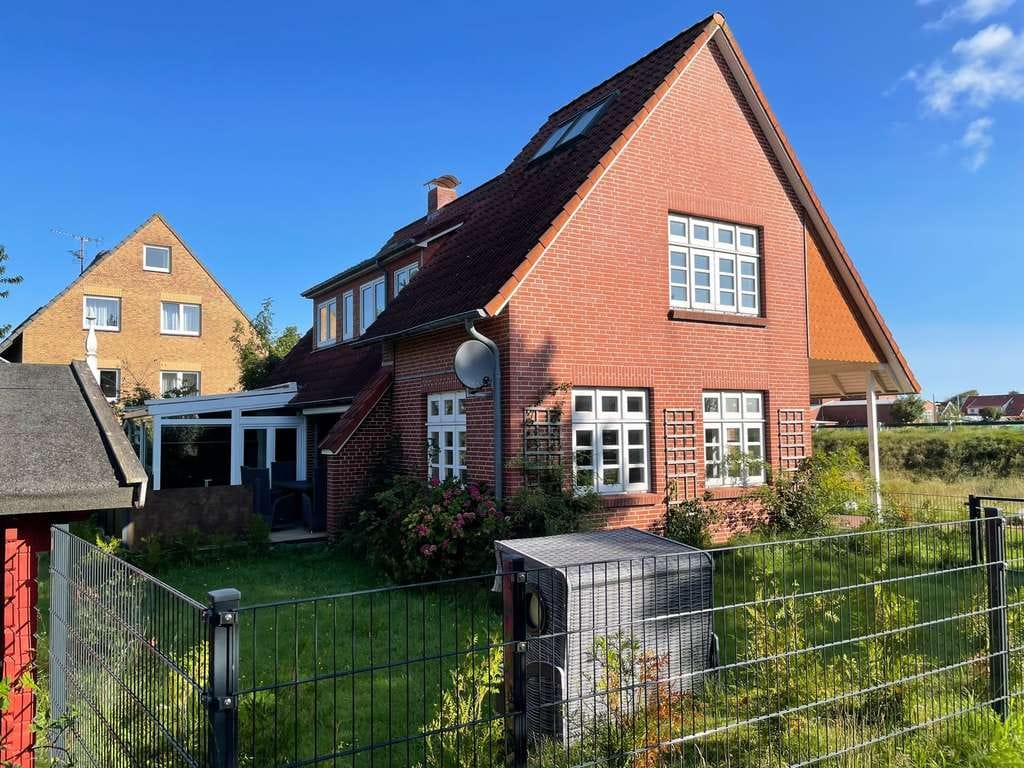 Immobilie in Langeoog - LANGEOOG: Exklusives 5 ***** Ferienhaus in begehrter Sackgassenlage unweit des Golfclubs! - Bild 0