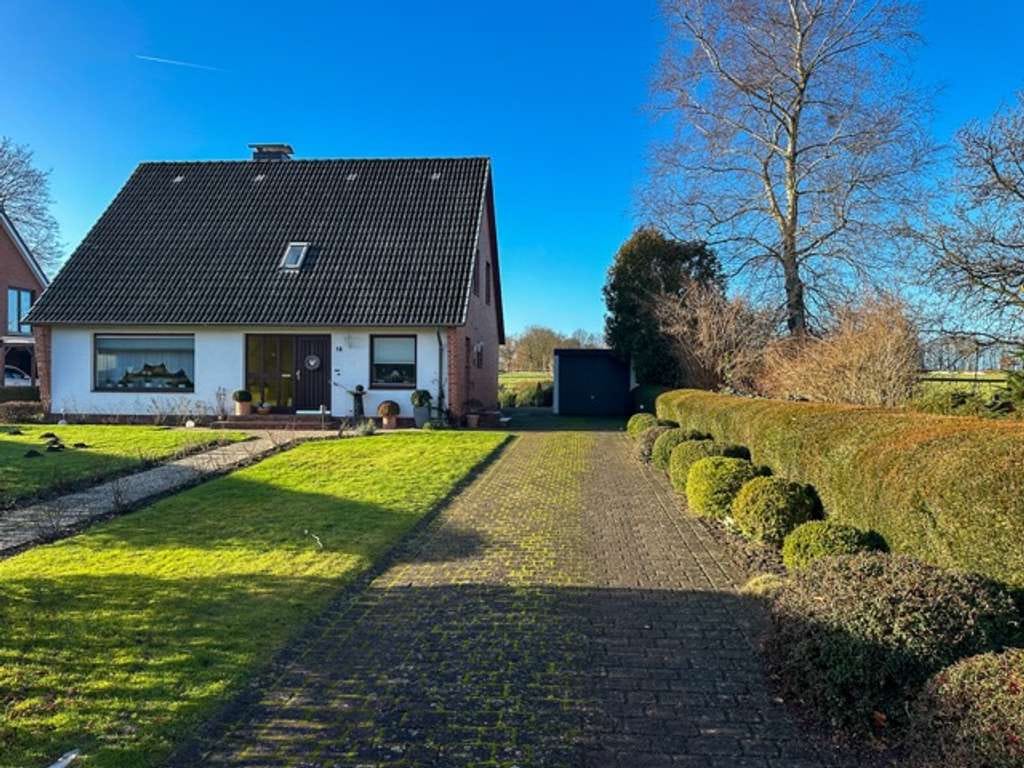 Immobilie in Tellingstedt - Großzügiges Einfamilienhaus in ruhiger Lage mit Wiesenblick in Tellingstedt zu verkaufen - Bild 2