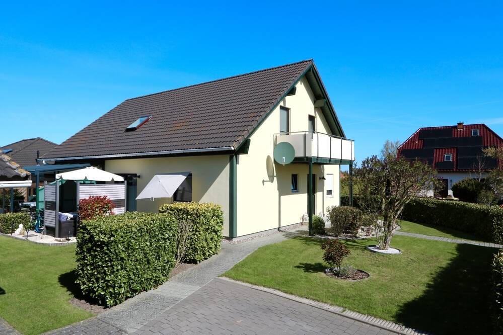 Immobilie in Mönchhagen - Clever finanzieren durch Vermietung! Ca. 178m² großes EFH mit ELW u. Carport auf 579m² großem Grdst. - Bild 2