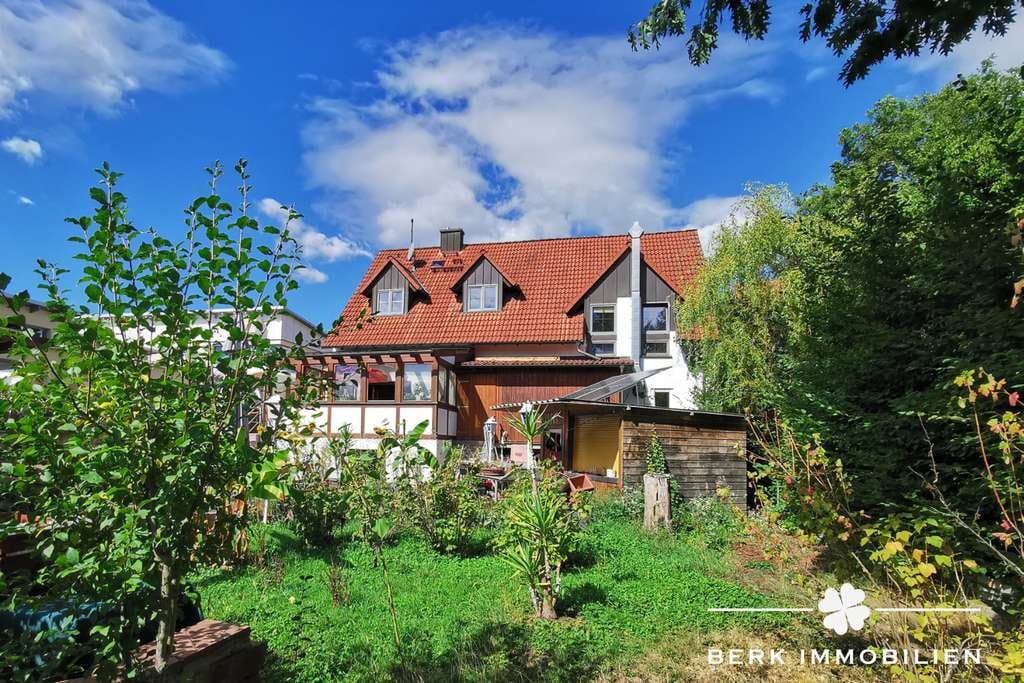 Immobilie in Eschau - BERK Immobilien - Großzügiges Zuhause mit idyllischem Garten und lichtdurchflutetem Wintergarten - Bild 0