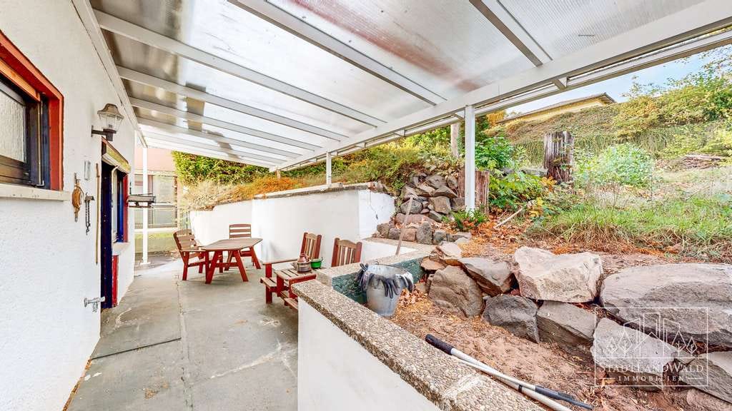 Immobilie in Fischbach bei Dahn - Erhöht wohnen, entspannt leben – Einfamilienhaus mit Fernsicht, Garten und Garagen - Bild 3