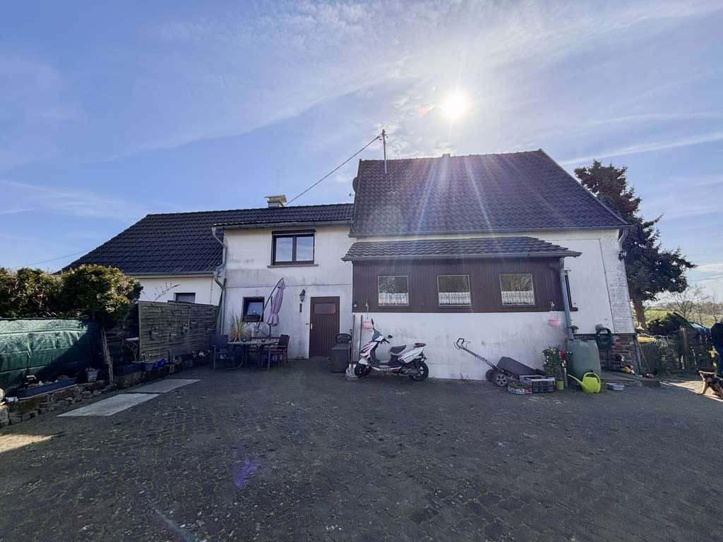 Immobilie in Windeck - Vermietetes Einfamilienhaus am Ortsrand von Windeck mit Garten und Perspektive zur Wertsteigerung! - Bild 1