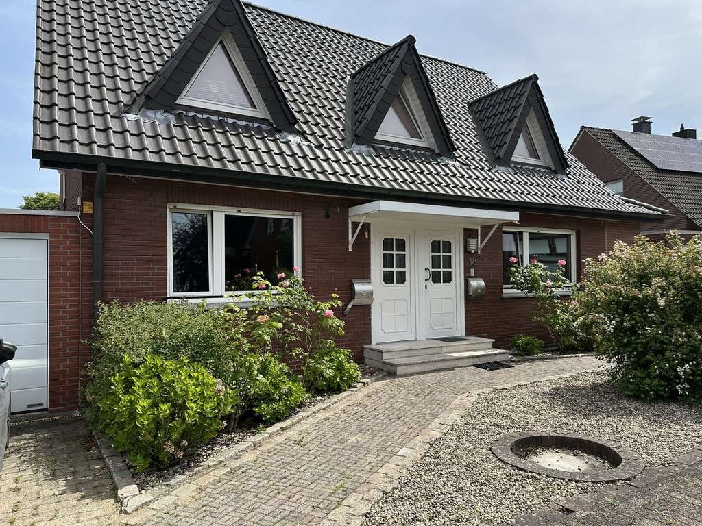 Immobilie in Laer - Wohnen mit Charakter: Einfamilienhaus in Laer mit vermieter Einliegerwohnung - Bild 1