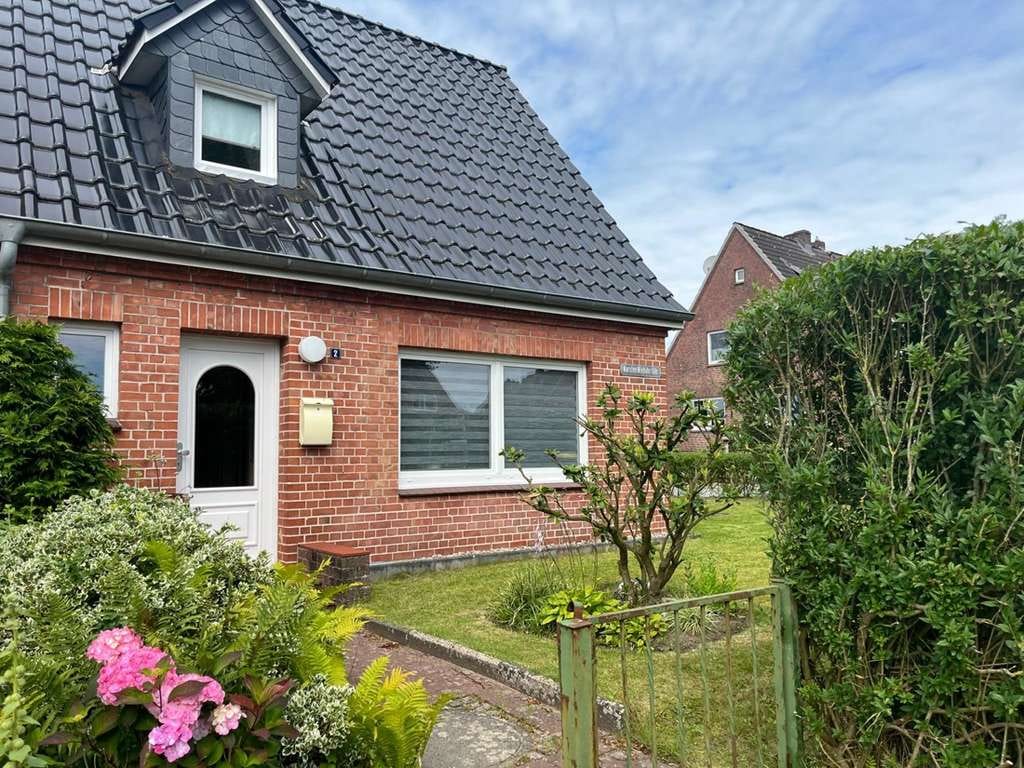 Immobilie in Meldorf - Charmante Doppelhaushälfte mit modernem Komfort und historischen Flair - Bild 0