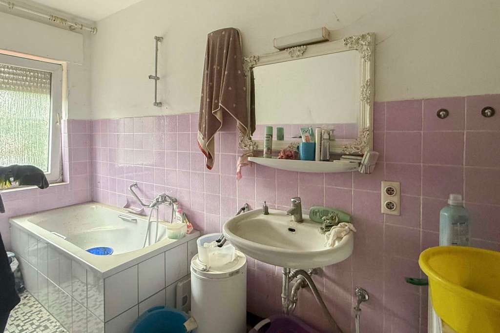 Immobilie in Löhne - Ihr Projekt wartet: Modernisierungsbedürftiges Zweifamilienhaus auf großem Grundstück in Löhne - Bild 3