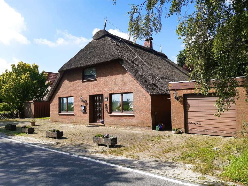 Immobilie in Nordenham - Gemütliches Reetdachhaus in herrlich ruhiger Wohnlage - Bild 1