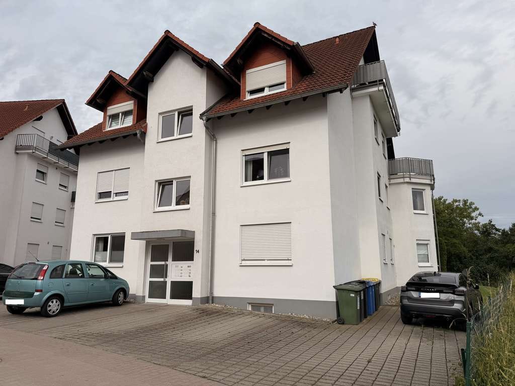 Immobilie in Wörrstadt - Helle 4-Zimmer-Maisonettewohnung mit 2 Balkonen, Weitblick und 2 Stellplätzen - Bild 1