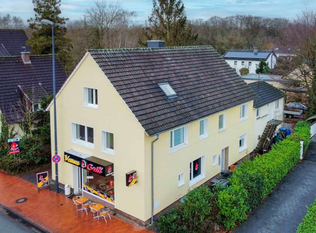 Immobilie in Gütersloh - Vollvermietetes Wohn- und Geschäftshaus (5 WE + Gewerbe) in zentraler Lage von Gütersloh - Bild 2