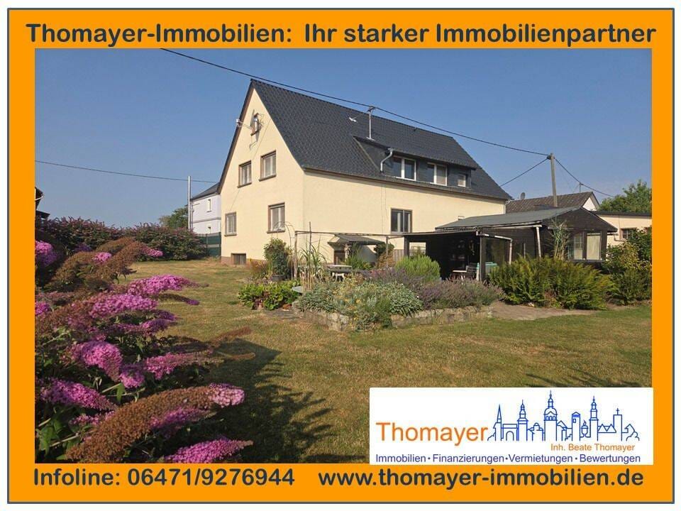 Immobilie in Beselich - ***Gepflegtes Raumwunder in Ortsrandlage mit großem Garten und 2 Garagen!!!*** - Bild 0