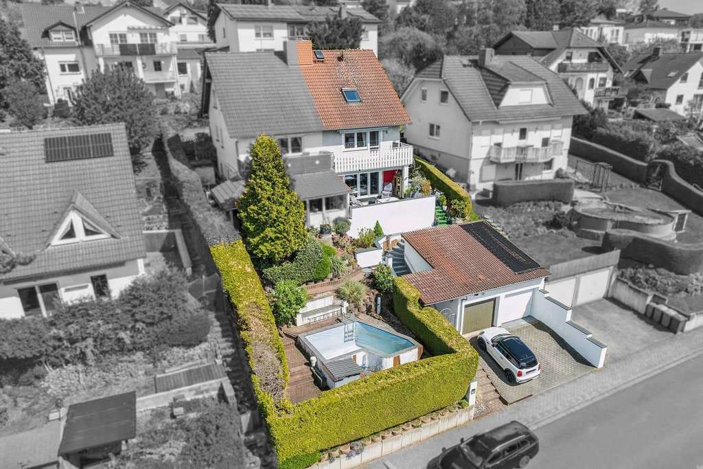 Immobilie in Ronneburg - Schicke Doppelhaushälfte mit Garage, Pool und traumhafter Aussicht - Bild 2