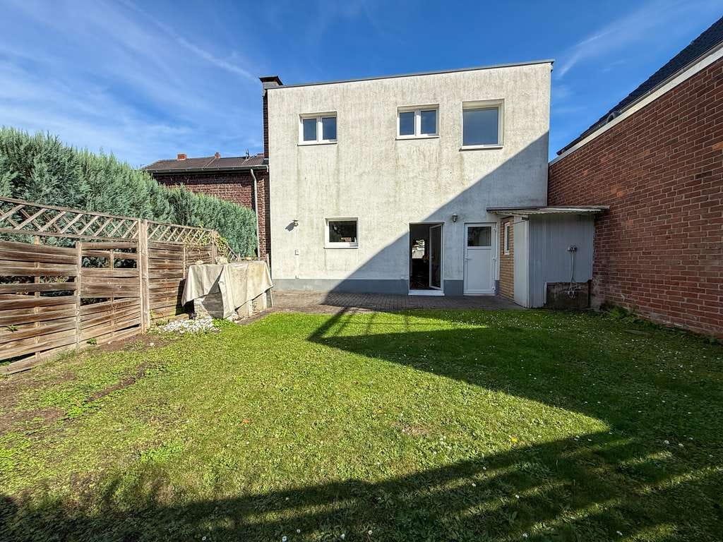 Immobilie in Tönisvorst - Grün wohnen im Zentrum: Wohnung mit Garten in St. Tönis - Bild 0