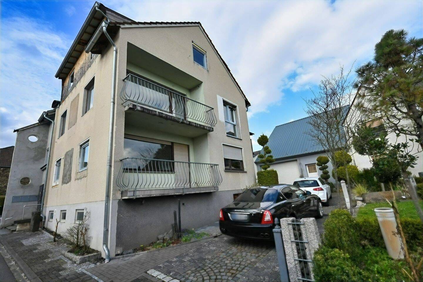 Immobilie in Dahlheim - Mehrfamilienhaus mit 4 Wohneinheiten, Scheune und Garten - Bild 0