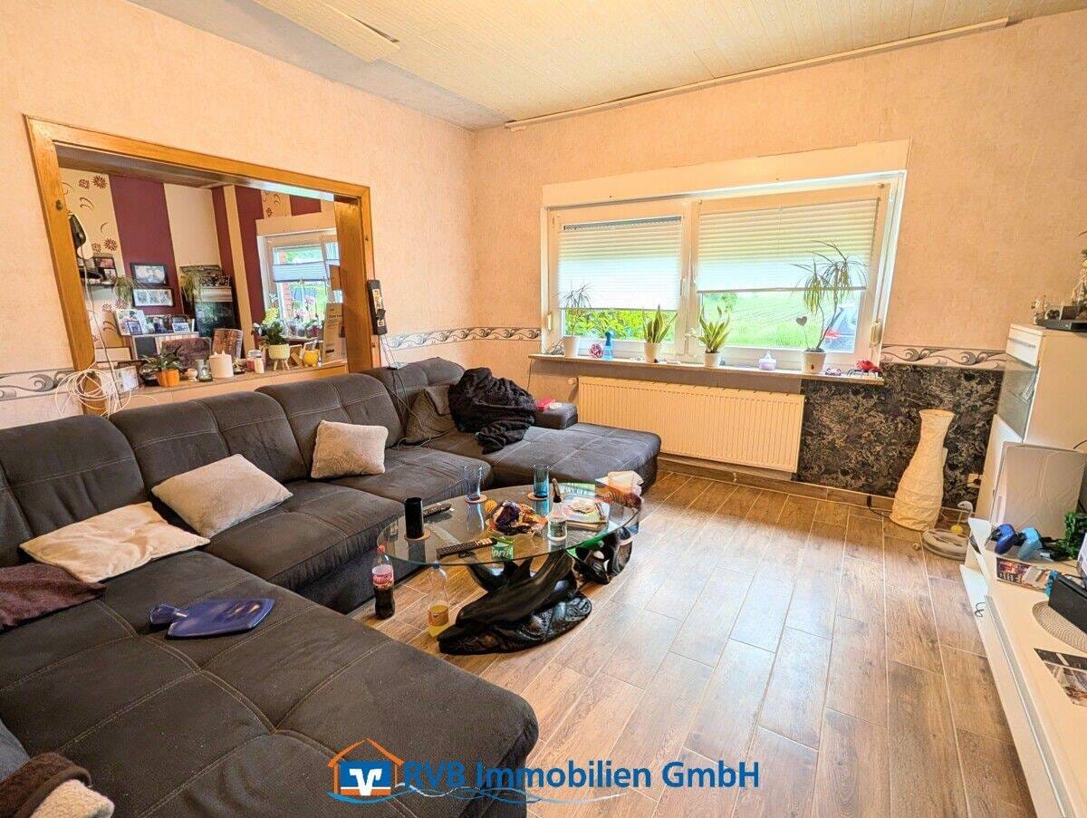 Immobilie in Neukamperfehn - Handwerker aufgepasst - vermietetes Einfamilienhaus mit unverbautem Blick - Bild 4