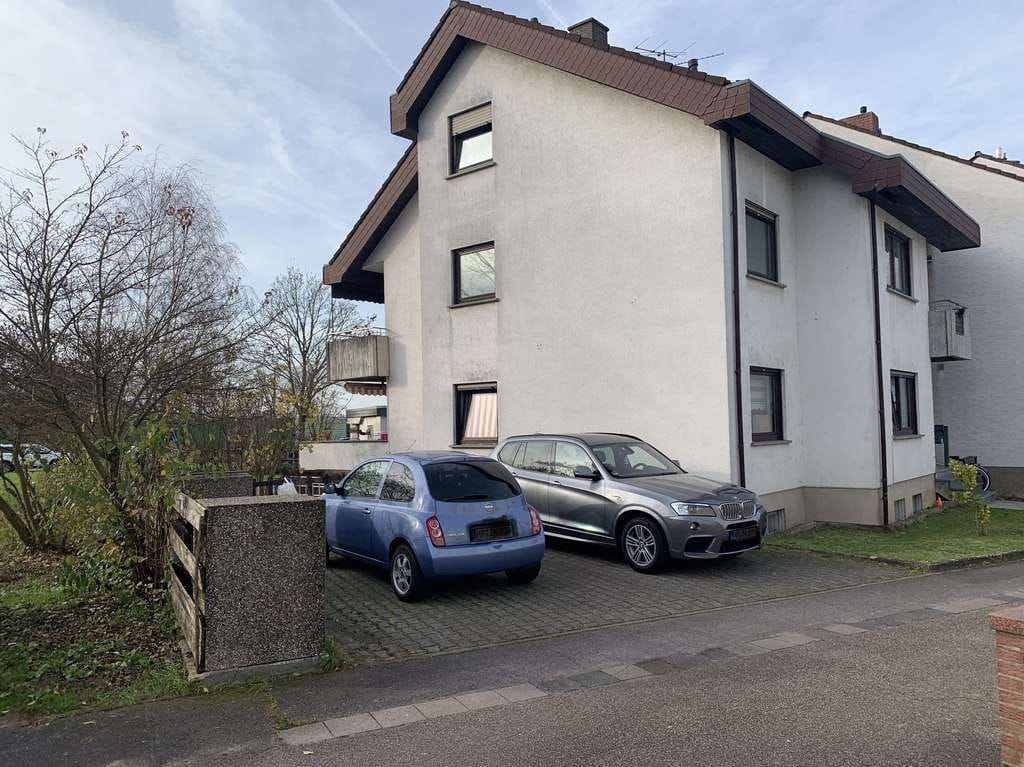 Immobilie in Bürstadt - Sehr schönes Wohnhaus mit Garten, Garage und 3-Wohneinheiten - Bild 1