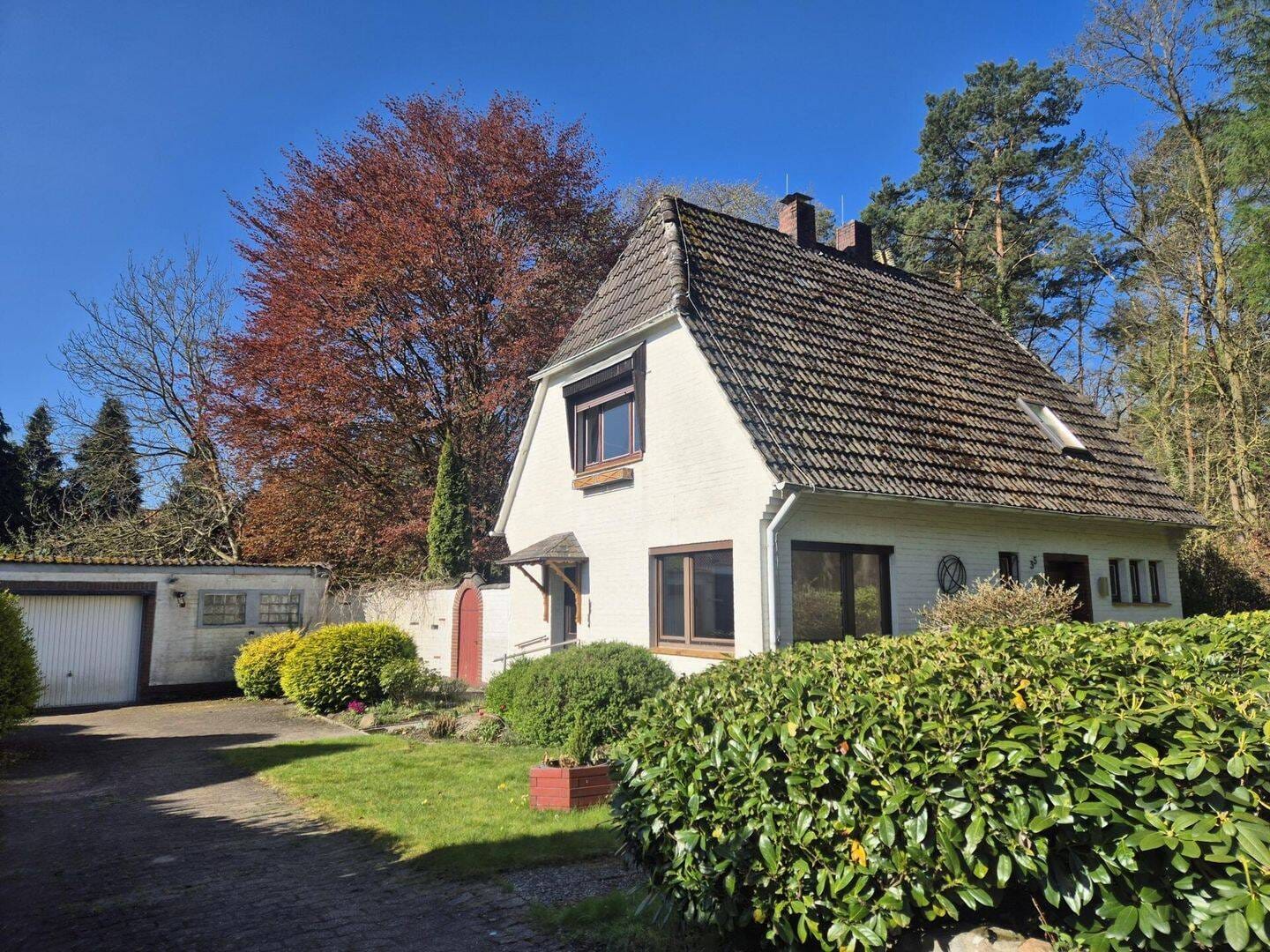 Immobilie in Dötlingen - Sanierungsbedürftiges Wohnhaus auf traumhaftem Grundstück in Waldrandlage in Dötlingen - Bild 0