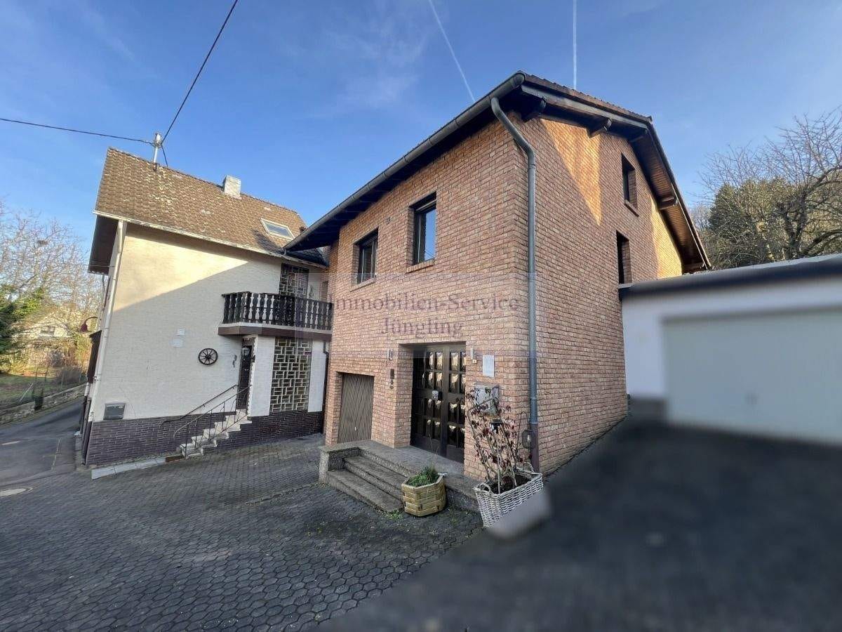 Immobilie in Hönningen - Zweifamilienhaus in Hönningen zu verkaufen. - Bild 0