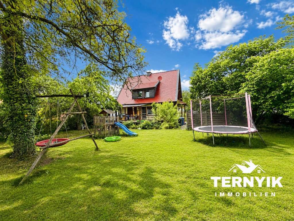 Immobilie in Uffenheim - Familientraum mit Paradiesgarten - Schnuckeliges Haus - 5 Zimmer, Terrasse, Doppelgarage, Bestlage! - Bild 0