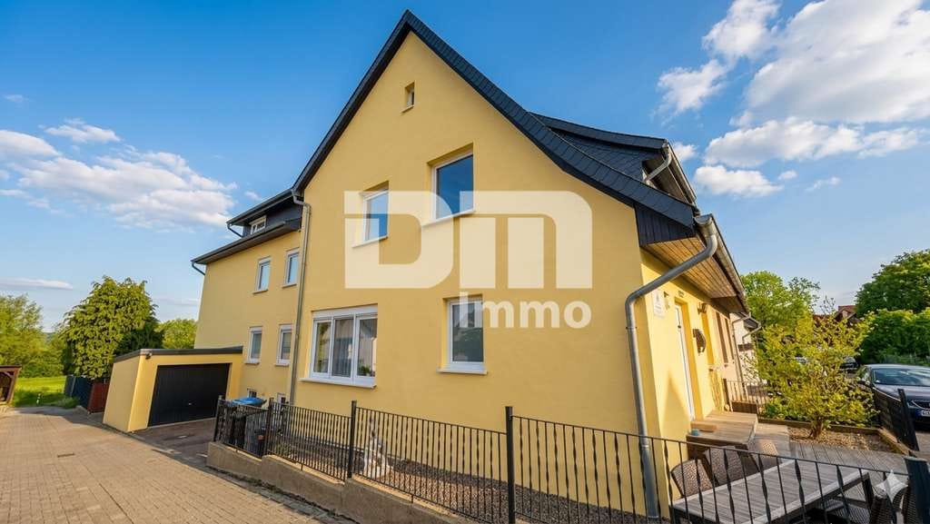 Immobilie in Northeim - Vielseitiges Immobilien-Ensemble mit 2 modernisierten Haushälften + Carport und Garten/Terrasse - Bild 0