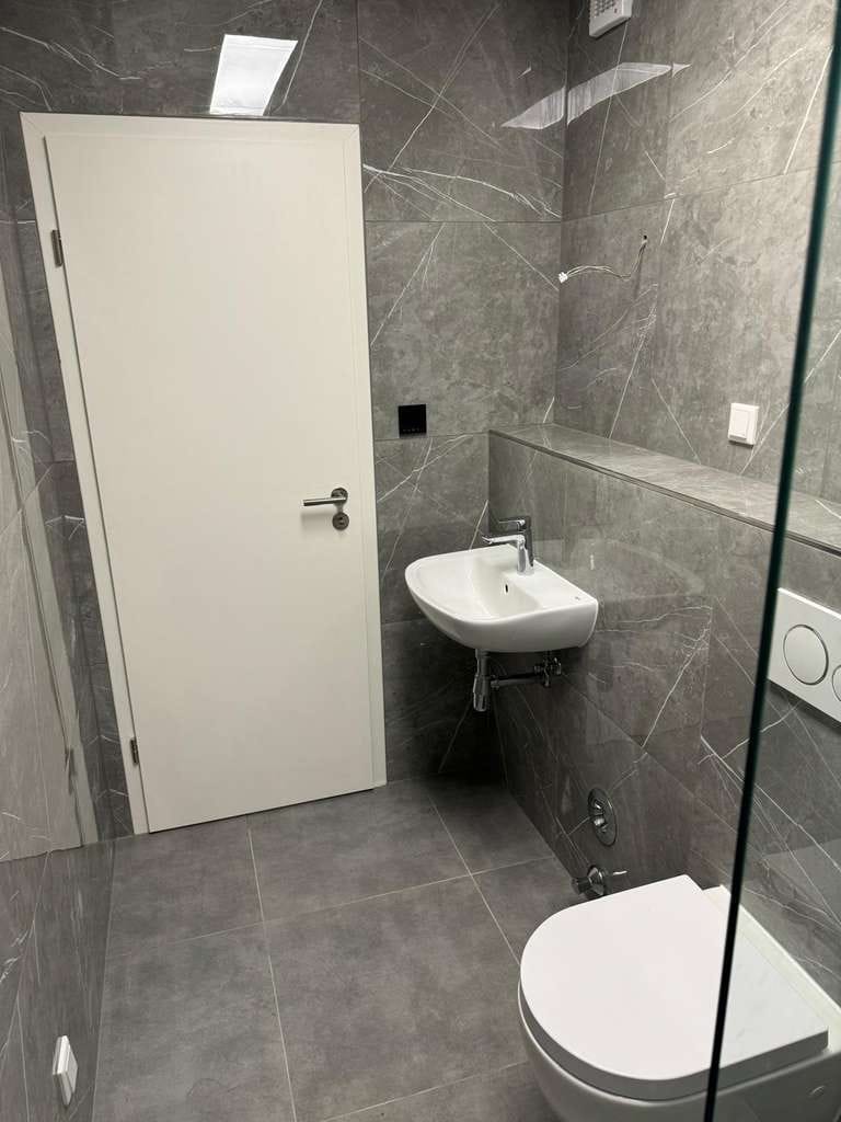Immobilie in Gummersbach - Modernisierte 3-Zimmer-Erdgeschosswohnung mit Balkon, Stellplatz und Einbauküche - Bild 2