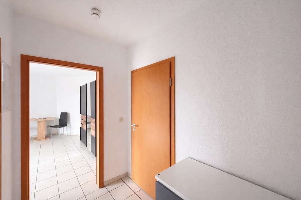 Immobilie in Saarlouis - Charmante 1-Zimmer-Wohnung mit Balkon und Weitblick in Saarlouis-Roden! - Bild 1