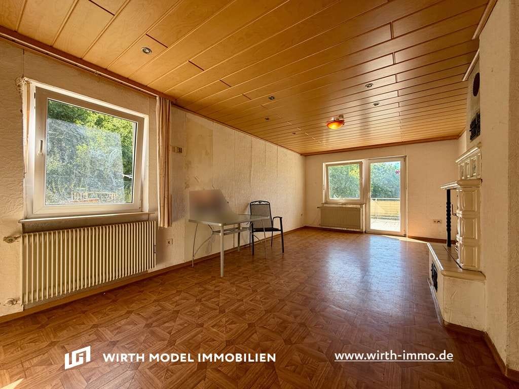 Immobilie in Poppenhausen - Einfamilienhaus mit Garage und Garten in schöner Ortsrandlage in Poppenhausen-Hain - Bild 1