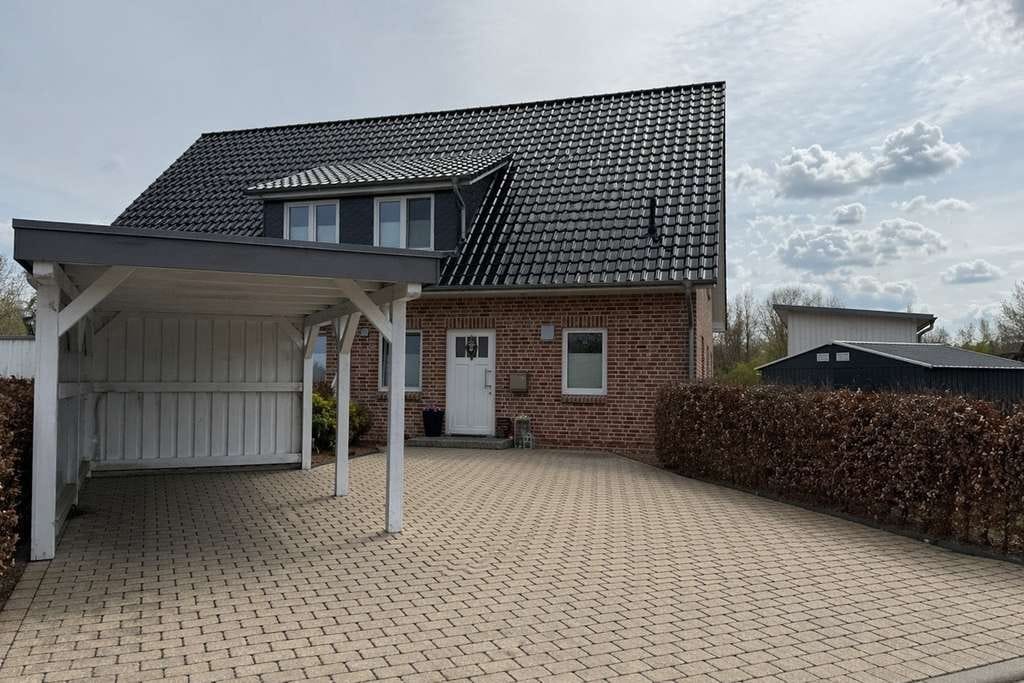 Immobilie in Heeslingen - Vermietete, energieeffiziente DHH in ruhiger Lage - Bild 1