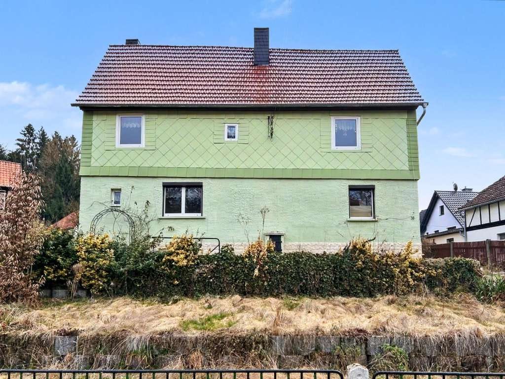 Immobilie in Lichtenau - Provisionsfrei für Käufer - Einfamilienhaus mit Nebengelass und Potential in Ottendorf - Bild 1