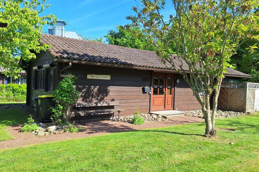 Immobilie in Damp - Blockhaus in TOP-Lage mit großem Grundstück und Wintergarten - Bild 0