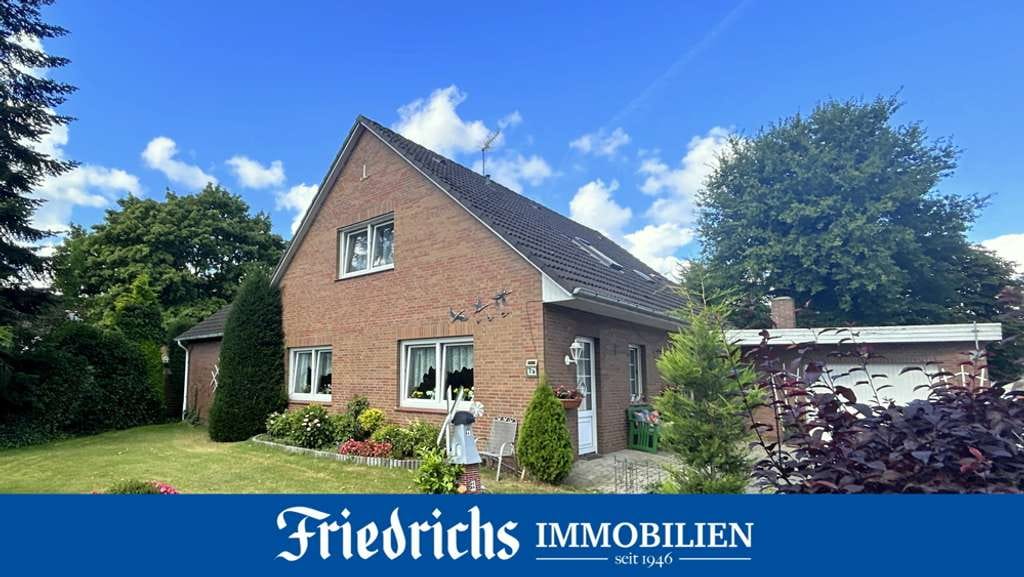 Immobilie in Edewecht - Ein-/Zweifamilienhaus mit großzü. Garten, Garage sowie abtrennbarem Bauplatz in Edewecht-Osterscheps - Bild 0