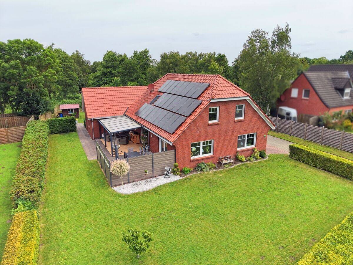 Immobilie in Osteel - Energieeffizient und küstennah: Einfamilienhaus mit Garage, Wärmepumpe und PV-Anlage in Osteel - Bild 1