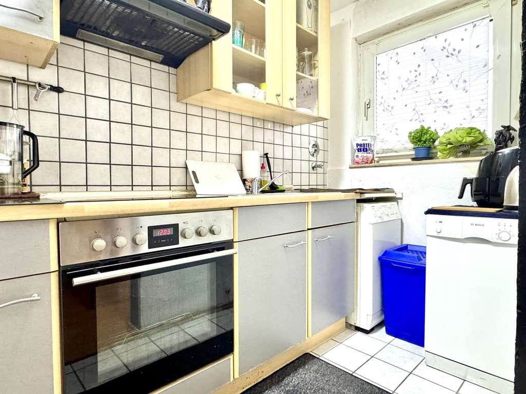Immobilie in Wunstorf - RUDNICK bietet ZENTRALE LAGE: Schöne 1-Zimmer Wohnung mit Balkon und Lift - Bild 4