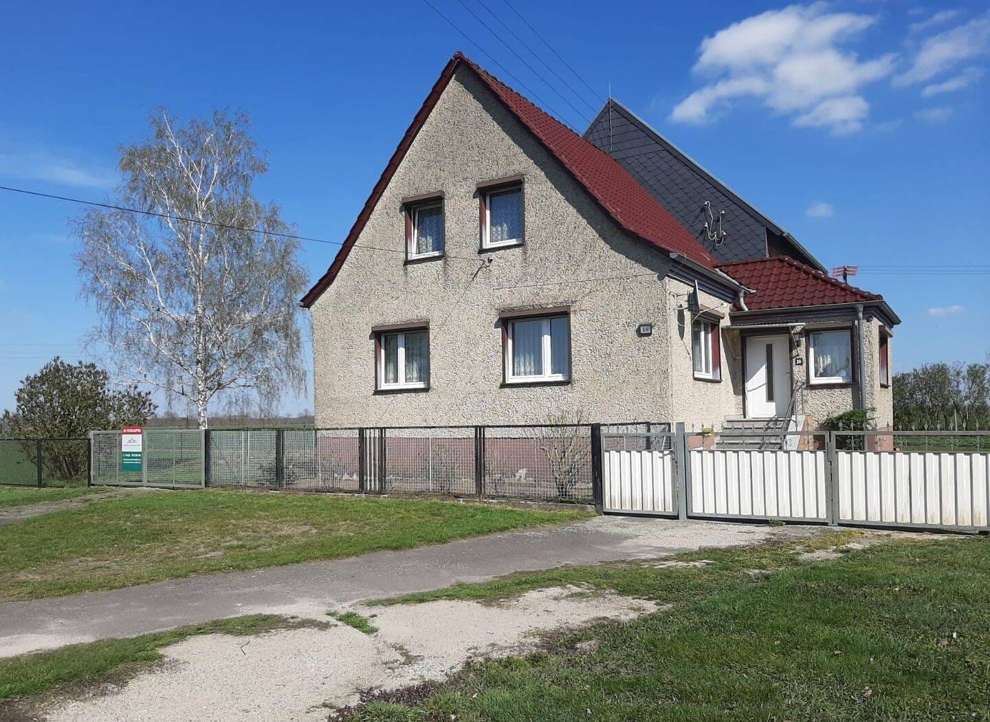 Immobilie in Alt Tucheband - Einfamilienhaus mit großem Nebengelass  mit freiem Blick zum Reitweiner Sporn - Bild 0
