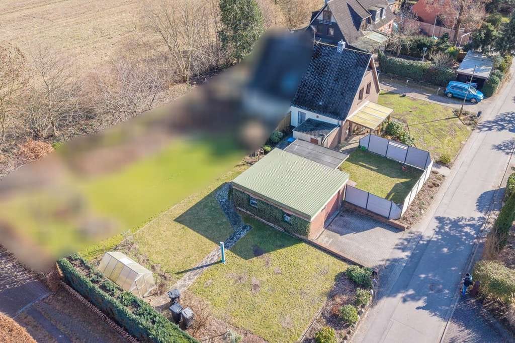 Immobilie in Osterby - Platzwunder mit großem Garten - Bild 2