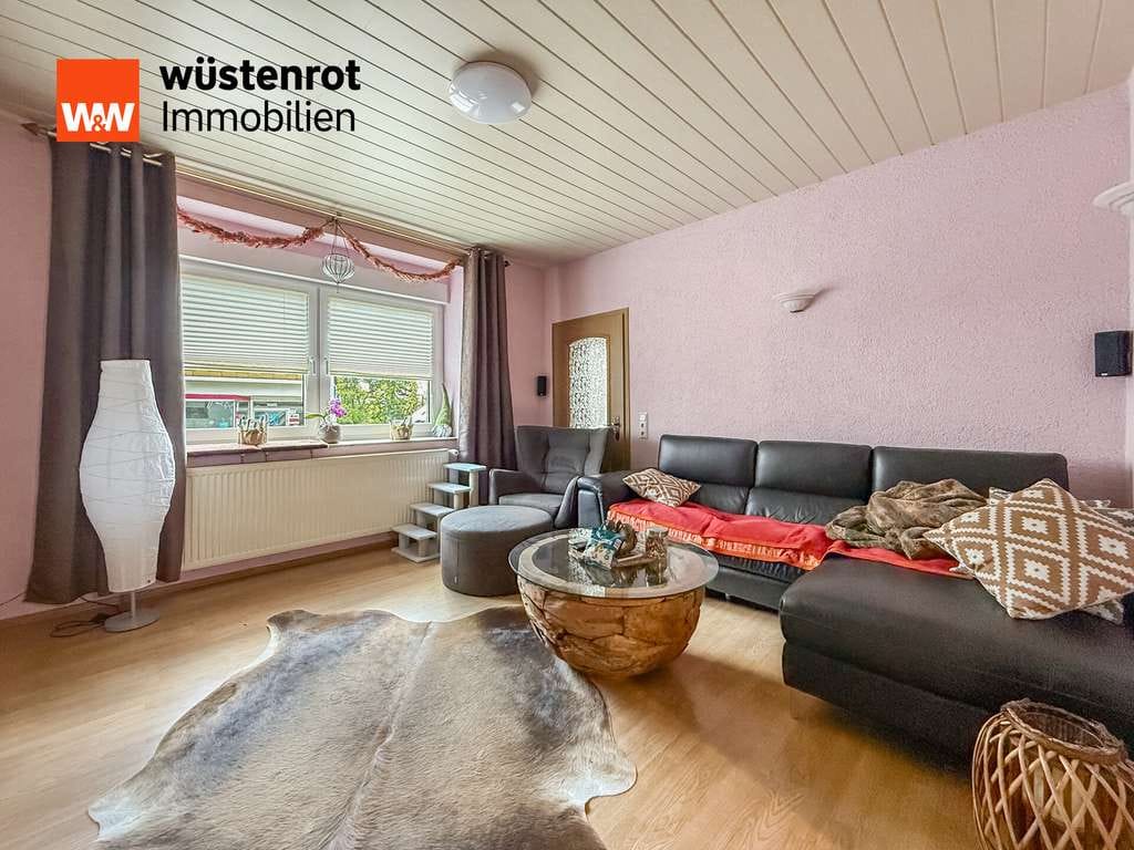 Immobilie in Merchweiler - Einziehen statt renovieren – Einfamilienhaus mit Wintergarten, 2 Bädern und Garage - Bild 1
