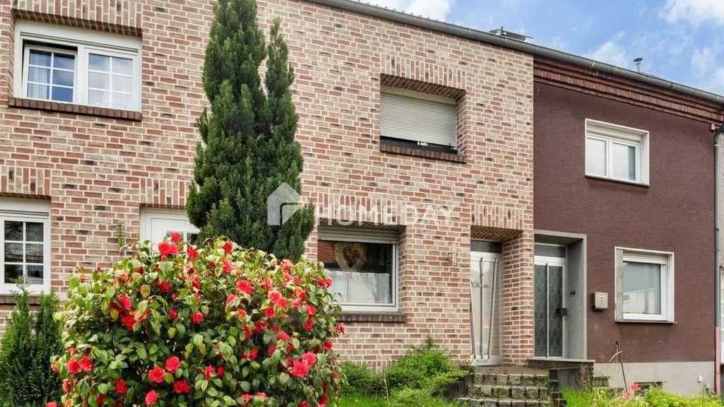 Immobilie in Ahlen - Wohnen mit Herz: Reihenhaus mit Kamin & sonniger Terrasse - Bild 0