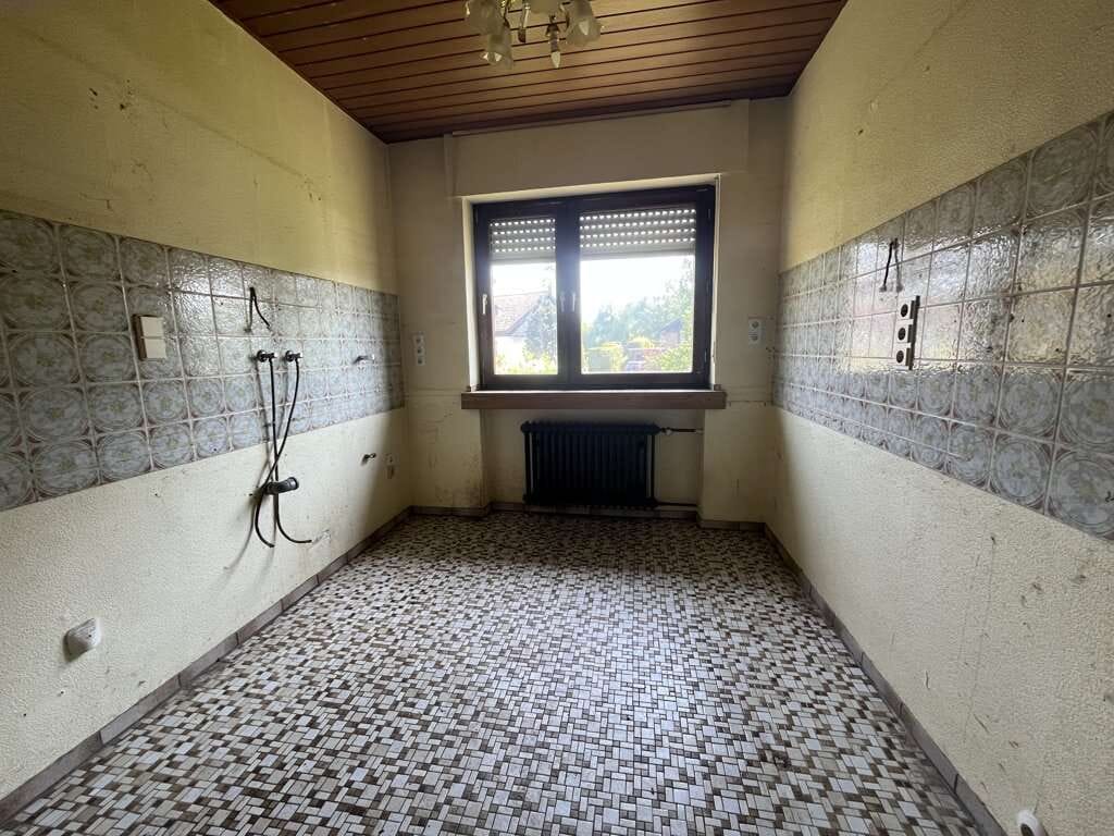 Immobilie in Simmerath - Freistehendes Einfamilienhaus mit Garage und großem Potenzial in ruhiger Lage von Lammersdorf - Bild 4