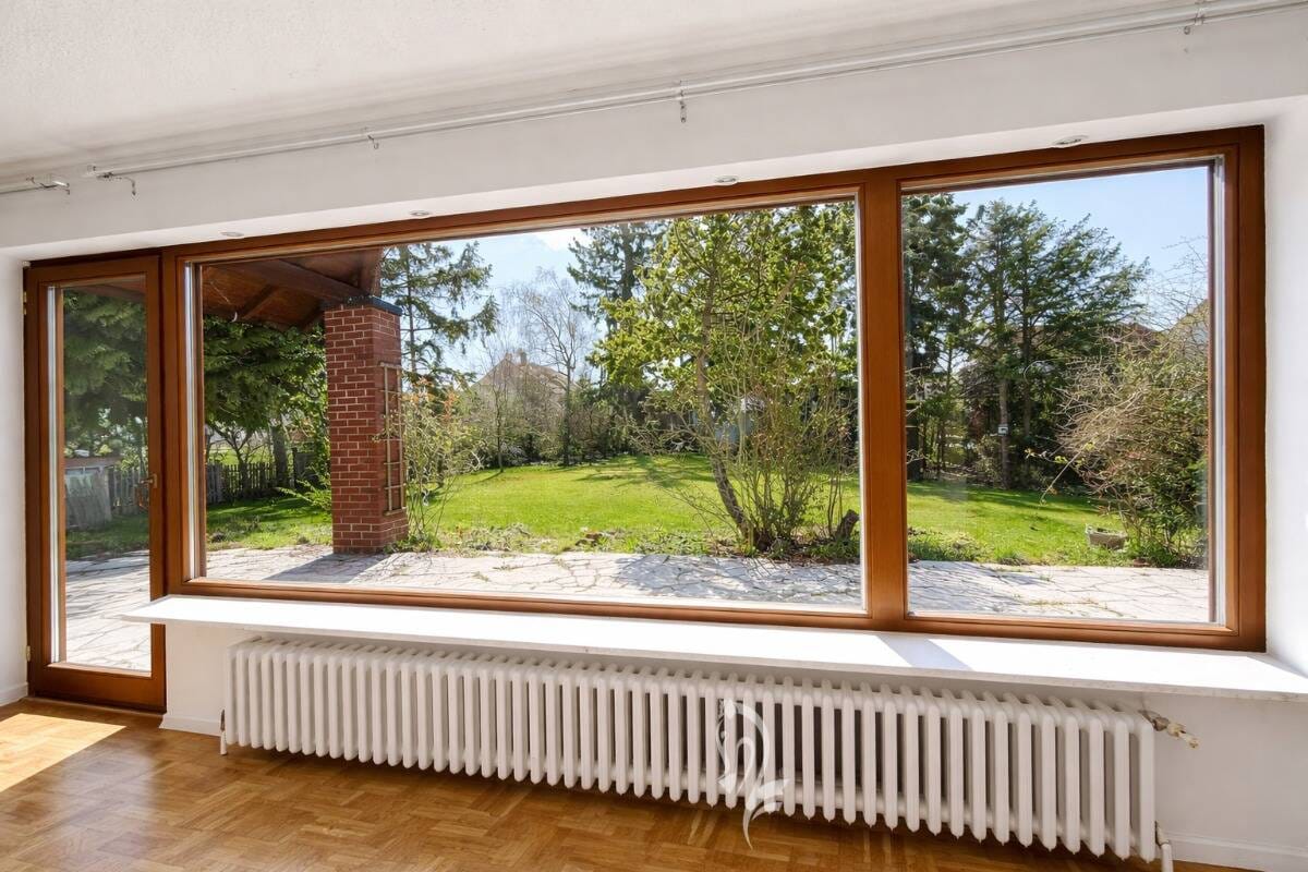 Immobilie in Unterpleichfeld - Architektenhaus mit großzügiger Einliegerwohnung und großem Garten in attraktiver Wohnlage - Bild 4