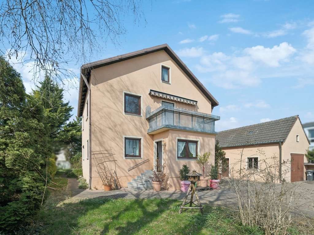 Immobilie in Hallbergmoos - Wunderschönes Zweifamilienhaus in begehrter und ruhiger Lage von Hallbergmoos - Bild 1