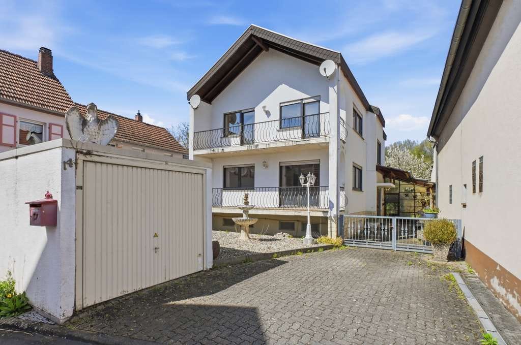 Immobilie in Billigheim-Ingenheim - Charmantes Einfamilienhaus mit Garage in ruhiger Lage von Ingenheim - Bild 1