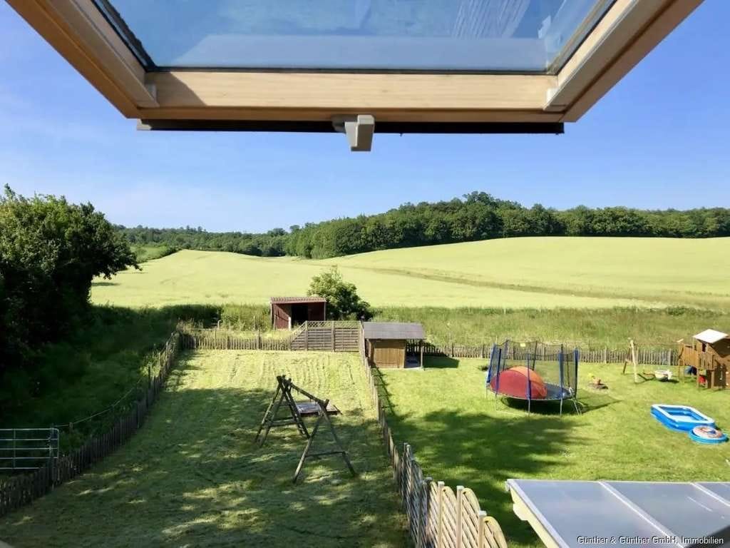 Immobilie in Ahrensbök - Sonniges Zweifamilienhaus - Mehrgenerationenwohnen in Ahrensbök Lebatz - Bild 2