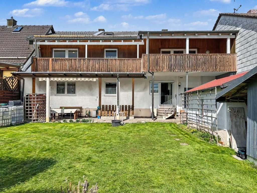 Immobilie in Taufkirchen - Gepflegtes Einfamilienmittelhaus in ruhiger Siedungslage von Taufkirchen (Vils) - Bild 1