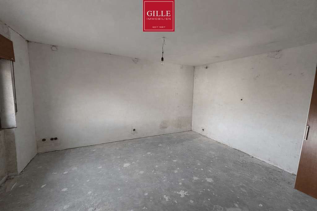 Immobilie in Rommerskirchen - Bungalow mit Innenhof,  Wärmepumpe und jeder Menge Potenzial - verwirklichen Sie Ihren Wohntraum - Bild 3