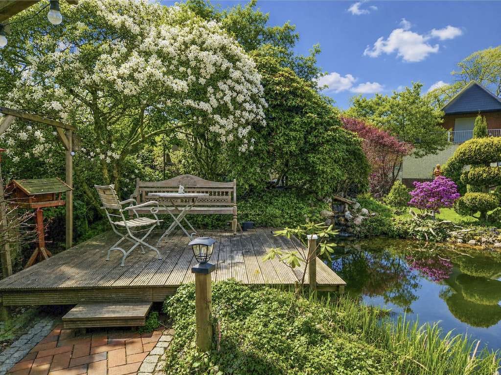 Immobilie in Hohenlockstedt - Zwischen Gartenidylle und Wohnkomfort – Großzügiges Ein-/Zweifamilienhaus auf 1.176 m² Traumgrundstü - Bild 2