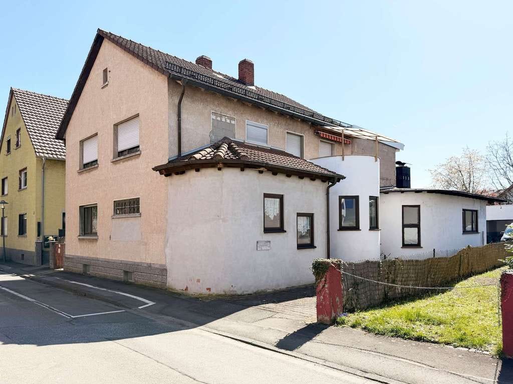 Immobilie in Bürstadt - Attraktive Erdgeschosswohnung mit Terrasse, Garten und viel Potenzial in ruhiger Lage von Bürstadt - Bild 1