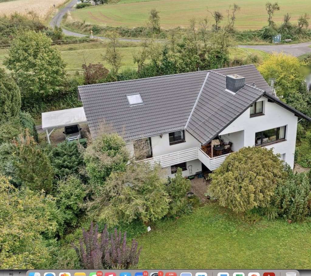 Immobilie in Ronneburg - Traumhaftes Einfamilienhaus mit Einliegerwohnung, sonniger Terrasse und TraumAussicht - Bild 0