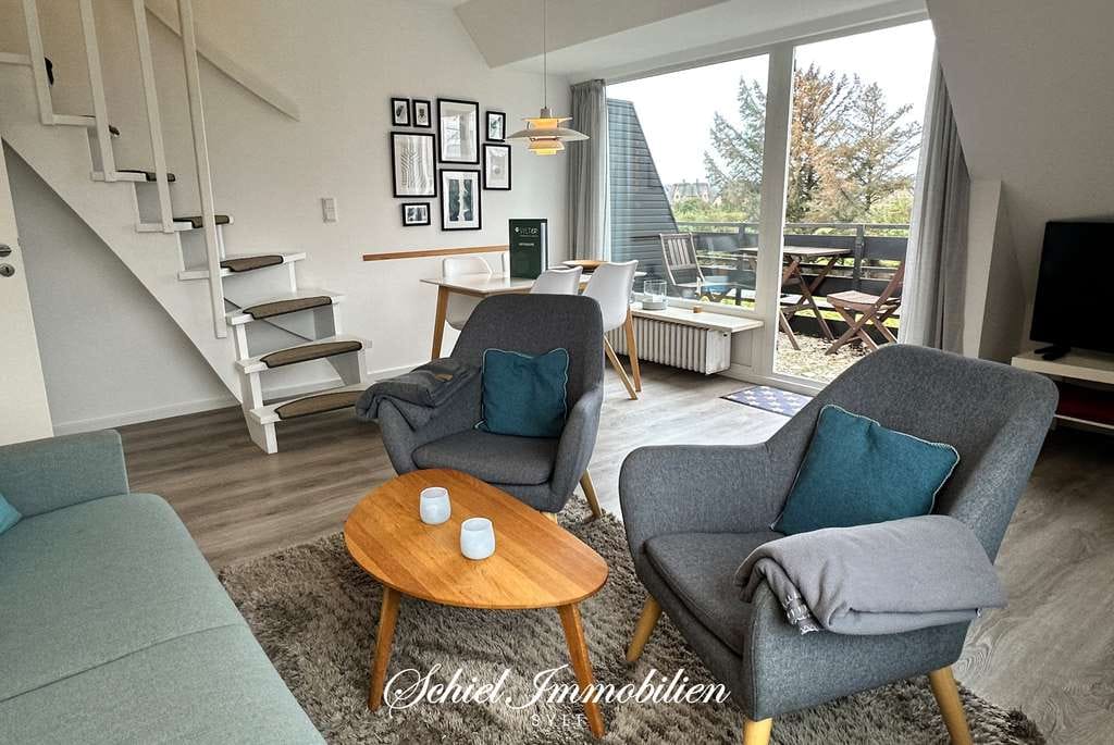 Immobilie in Wenningstedt-Braderup (Sylt) - Modernisierte 2-Zimmer-Ferienwohnung mit  sonnigem Westbalkon, Weitblick und Pkw-Stellplatz - Bild 1