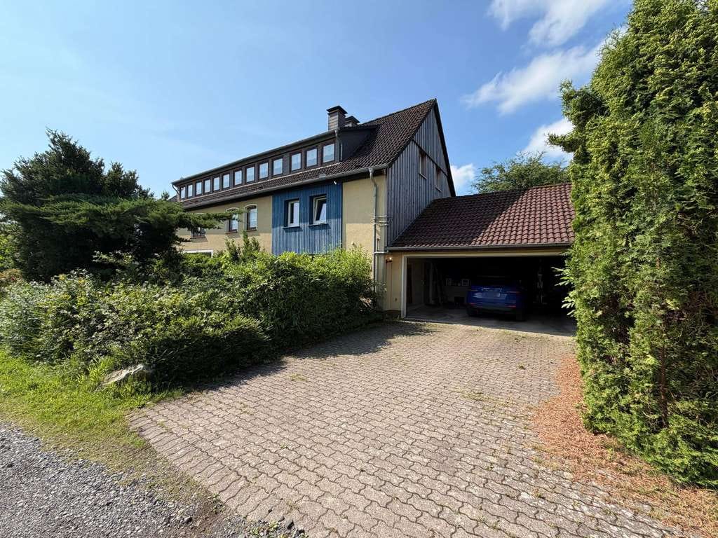 Immobilie in Extertal - Großzügiges Zweifamilienhaus mit Ausbaureserve und vielseitigen Nutzungsmöglichkeiten in Extertal! - Bild 4