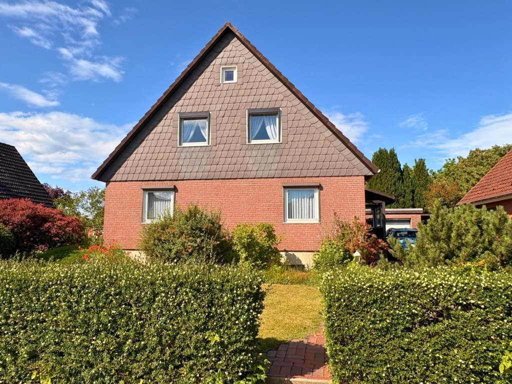 Immobilie in Ratzeburg - Individualisiertes OKAL-Haus mit Wintergarten, Garage und Optimierungsbedarf! - Bild 1